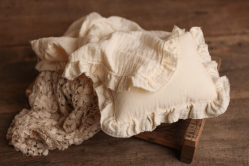 cream pillow and layer