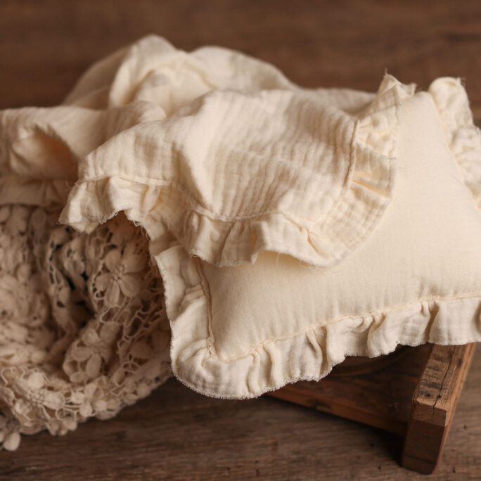 cream pillow and layer