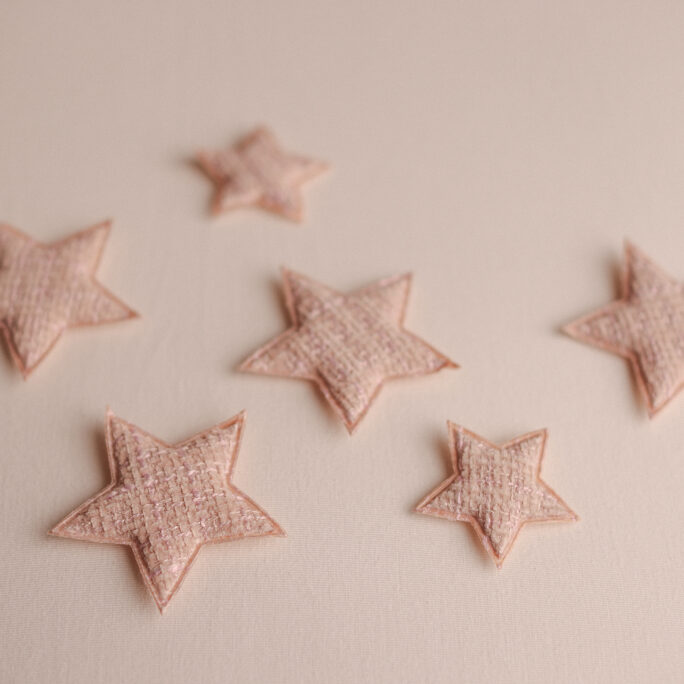 6 textured soft pink stars