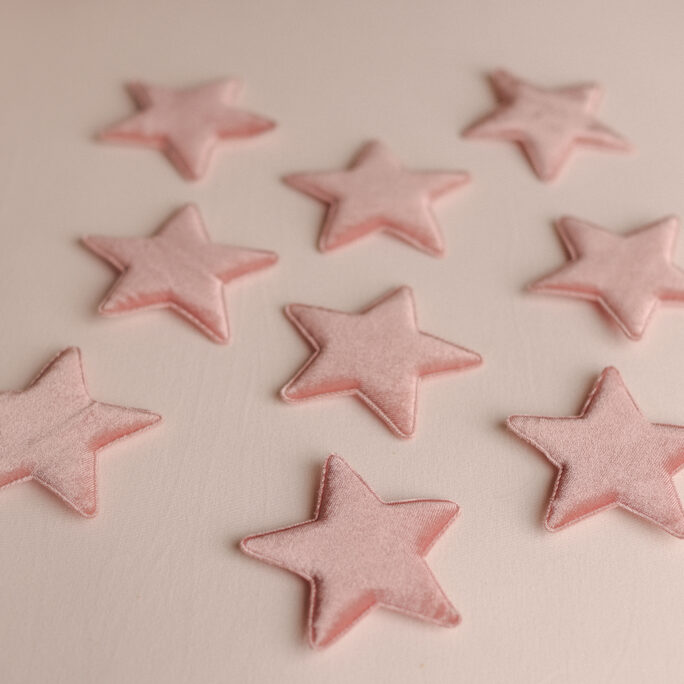 9 soft pink stars